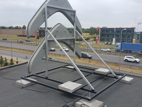 Andre motors Autosalons Logo uz jumta Ceros.LV